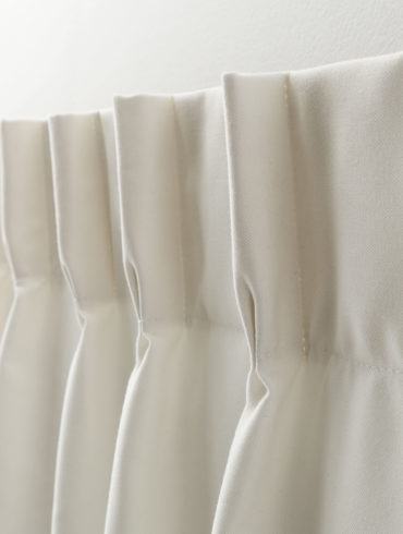 Tête de rideaux à plis